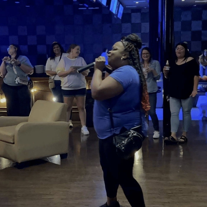 Adult woman doing karaoke