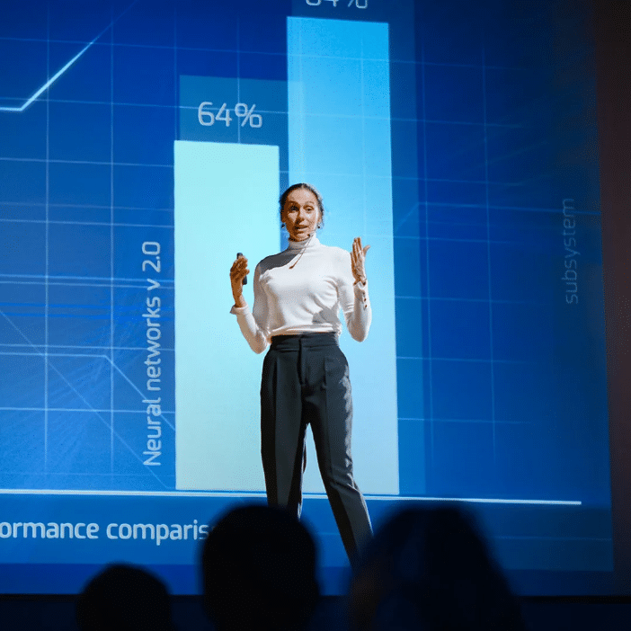 Adult woman doing a presentation on stage